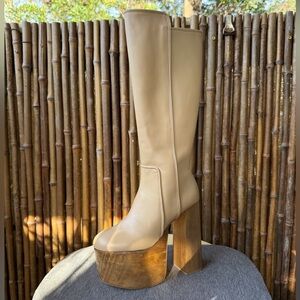 CULT GAIA platform knee high boots.
